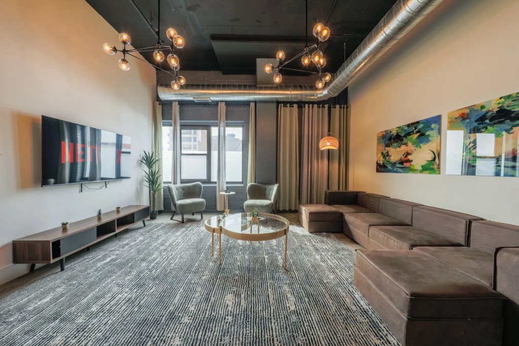 living room with brown sofa
