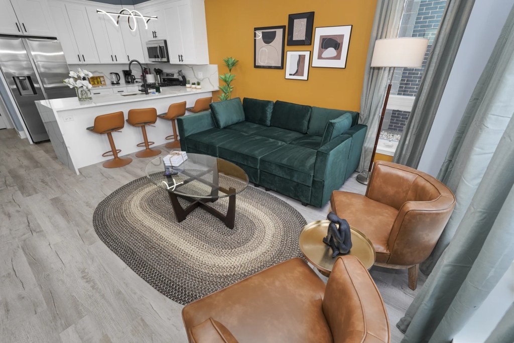 living room with green sofa